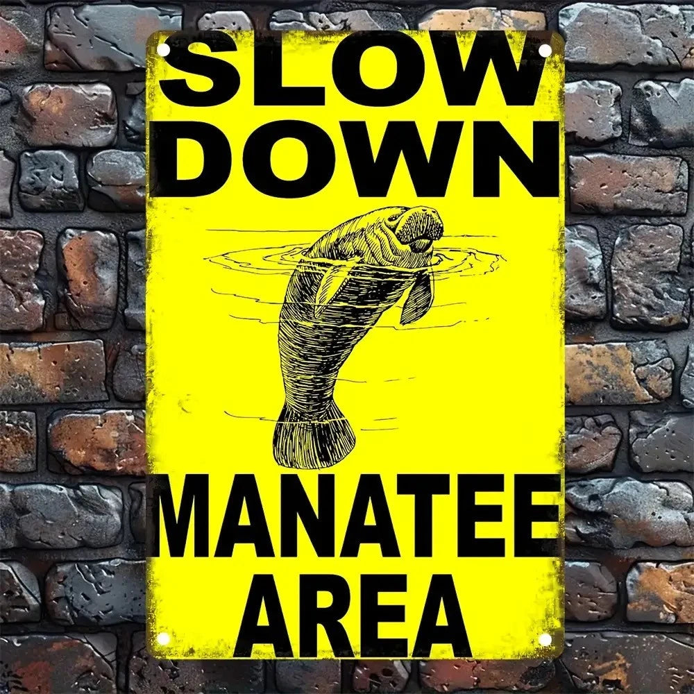 Manatee Vintage Slow Down Manatee Area Funny Aluminum Sign — product artwork