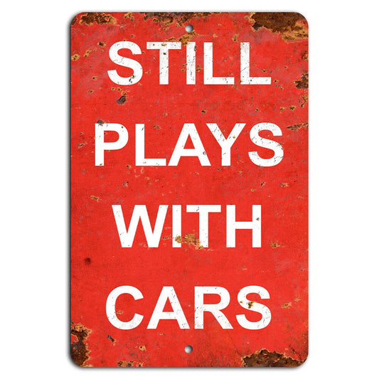 Vintage Still Plays with Cars Retro Aluminum Sign — product artwork